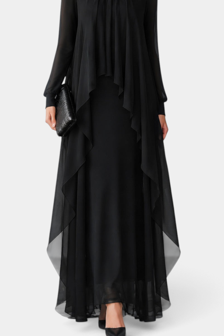 Mahaute Sophronie black long dress with sheer sleeves, high neckline, and elegant asymmetrical draped panels.