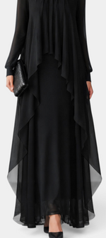 Mahaute Sophronie black long dress with sheer sleeves, high neckline, and elegant asymmetrical draped panels.