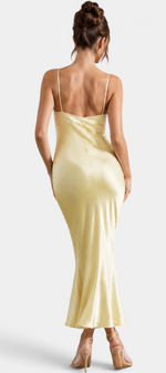 Mahaute Srebrina long champagne satin slip dress with thin straps and back view on a model