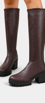 Mahaute Suny dark brown knee-high boots with a chunky block heel and thick lug sole for a modern urban look.