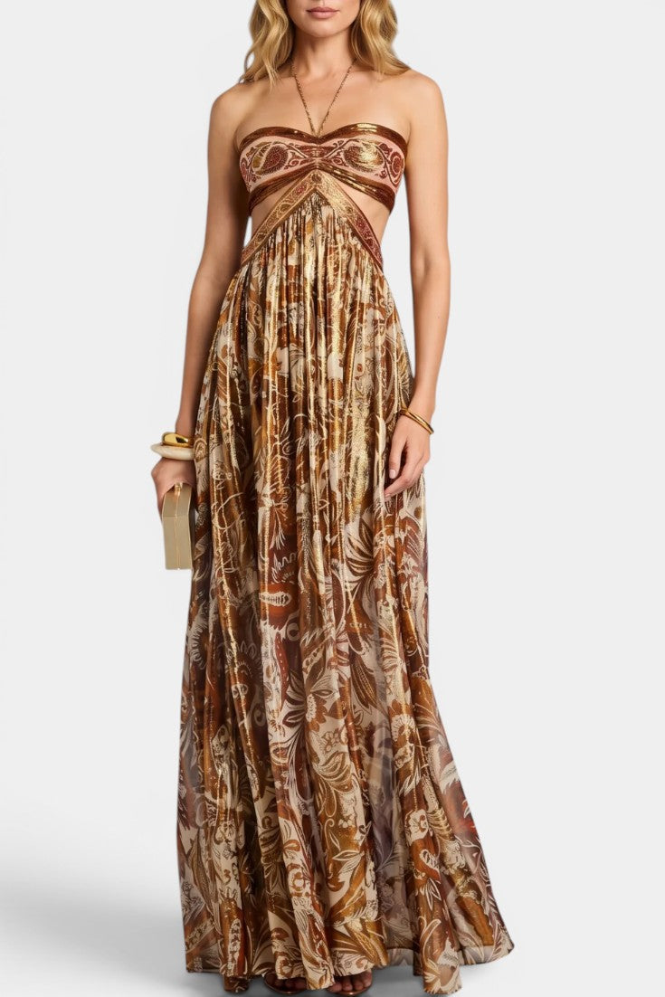 Robe longue Tasha de Mahaute en bronze métallisé, dos nu, col halter avec découpes et nœud ajustable, élégante et sophistiquée.