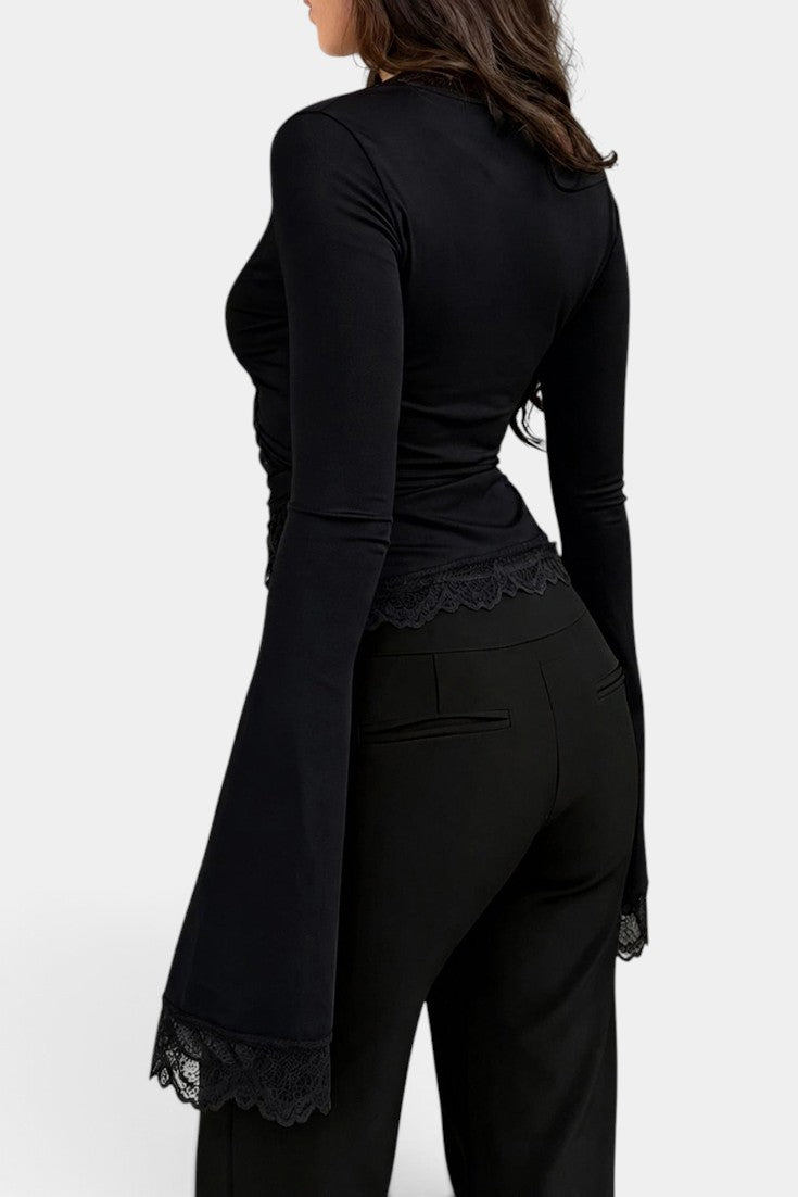 Top cache-cœur en dentelle florale Mahaute Teodora avec manches évasées et lien à nouer, style élégant et féminin.