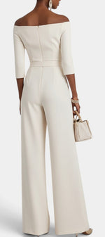 Back view of Mahaute Tisdale off-shoulder cream jumpsuit with wide-leg trousers and belted waist on a model