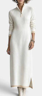 Mahaute Tryphena long cream knit dress with a zip-up mock neck, ribbed waist, chest pocket, and side slit detail.