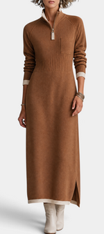 Mahaute Tryphena long brown knit dress with a zip-up mock neck, ribbed waist, chest pocket, and side slit detail.