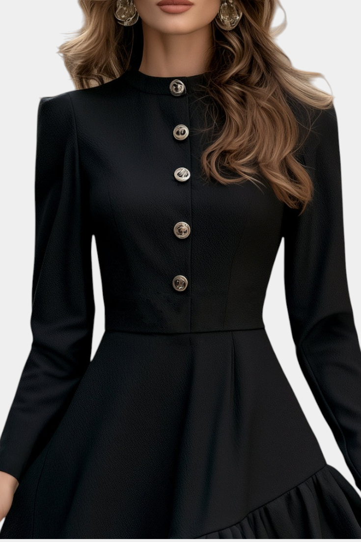 Mahaute Velislava black midi dress with long sleeves, fitted waist, and decorative jewel buttons on the front.