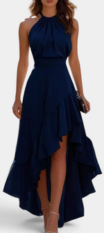 Mahaute Verity navy blue asymmetrical maxi dress with a pleated halter neckline and flowing ruffled skirt