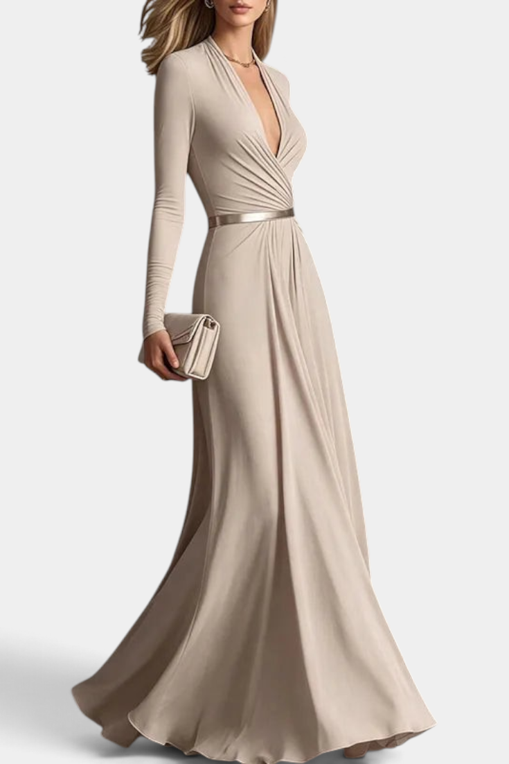 Mahaute Veselina long beige wrap dress with draped bodice, long sleeves, and a belted waist for formal occasions.