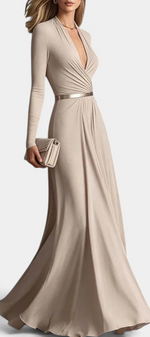 Mahaute Veselina long beige wrap dress with draped bodice, long sleeves, and a belted waist for formal occasions.
