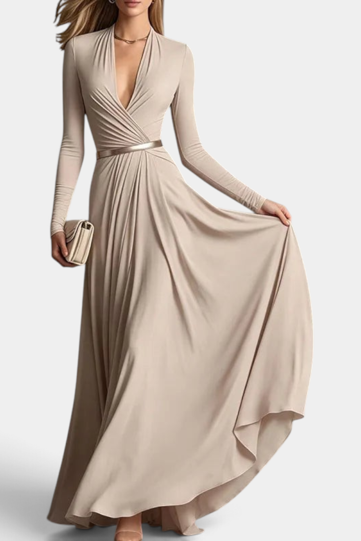 Mahaute Veselina beige long wrap dress with long sleeves, draped bodice, and belted waist for formal occasions.