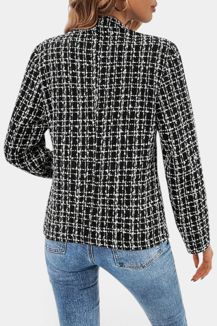 Back view of Mahaute Visenta short structured tweed jacket in black and white with a shirt collar