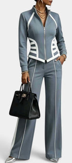 Mahaute Walters blue zip-up jacket and wide-leg trousers set with white graphic contrast trim on a model