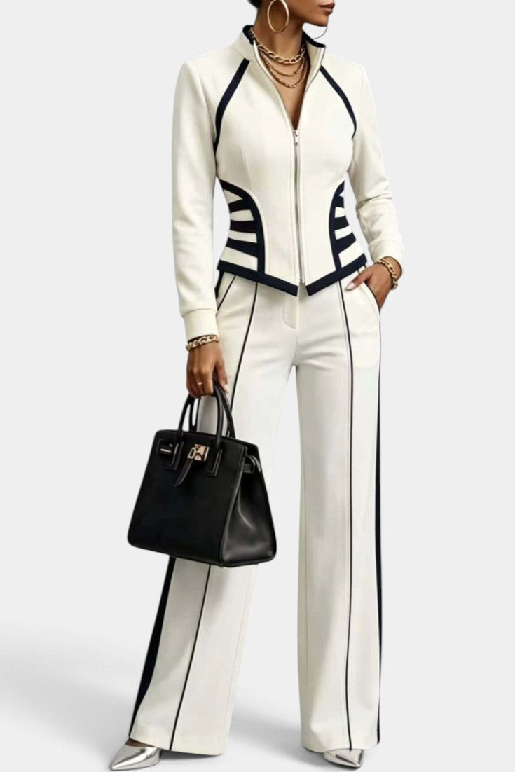Mahaute Walters cream zip-up jacket and wide-leg trousers set with black contrast piping and trim details.