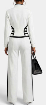 Back view of Mahaute Walters white zip-up jacket and wide-leg trousers set with black graphic contrast detailing.