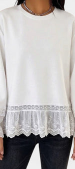 Mahaute white fluid blouse with 3/4 sleeves and delicate floral lace hem and cuff details