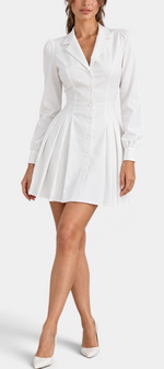 Mahaute Ruzha white short shirt dress with a collared neckline, button front, cinched waist, and pleated skirt.