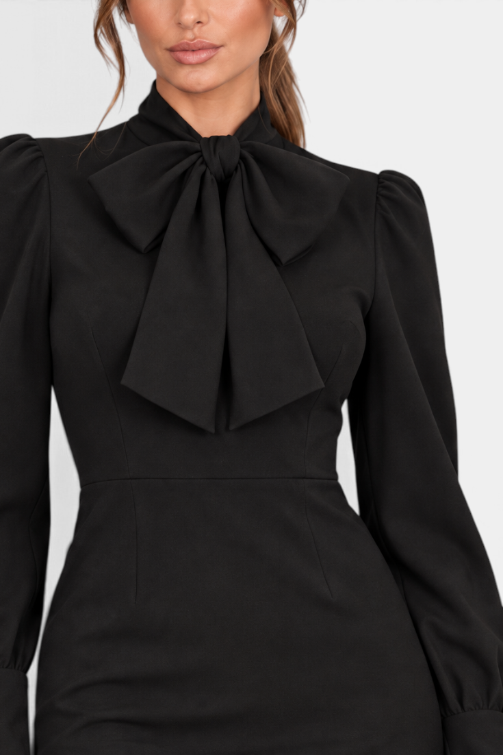 Mahaute Yordanka black midi dress featuring a sophisticated pussy-bow neckline and elegant puff sleeves.