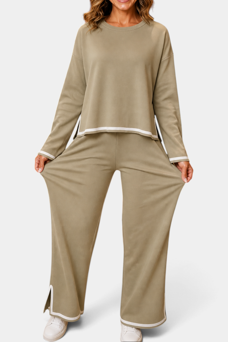 Mahaute Ysella beige knit lounge set with long-sleeve loose top and wide-leg trousers featuring white contrast trim.