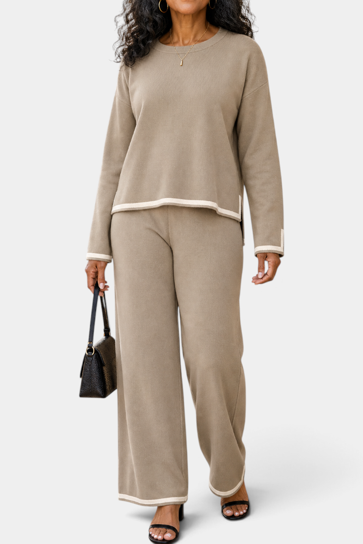 Mahaute Ysella beige knit lounge set with long sleeve top and wide leg trousers featuring white contrast trim details.