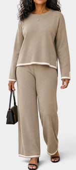 Mahaute Ysella beige knit lounge set with long sleeve top and wide leg trousers featuring white contrast trim details.