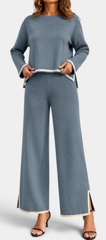 Mahaute Ysella blue knit lounge set featuring a loose long-sleeve top and wide-leg trousers with contrast trim.