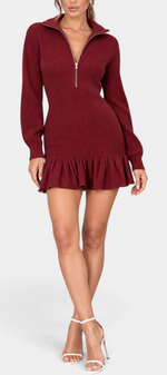 Mahaute Zdravka burgundy ribbed knit sweater dress with a zip collar, long sleeves, and a feminine ruffled hem.
